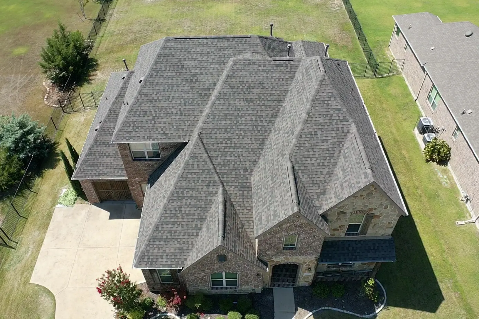 Aerial view of a completed Rubicon Roofing residential project in North Texas